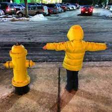 child and firehydran looking suspiciously similar